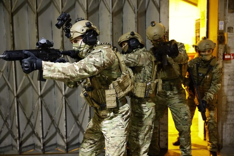 UK police body armour - tactical team with plate carriers